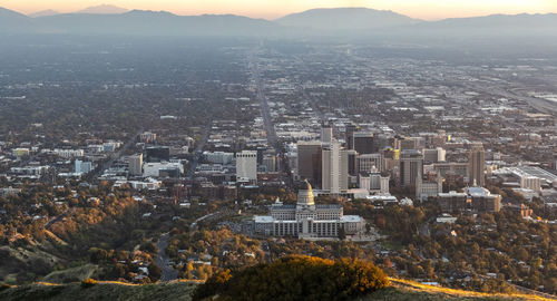 High angle view of city buildings against sky