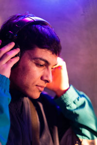 Portrait of trendy young man with headphones