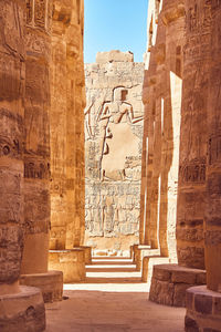 Karnak temple great hypostyle hall pillars in luxor - ancient thebes. pillars with hieroglyphs