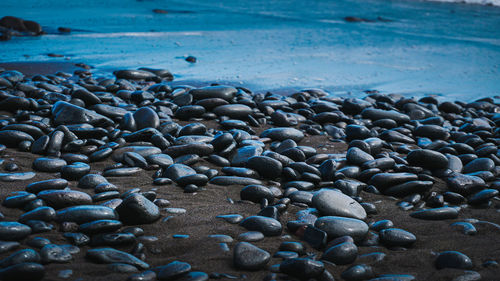 Close-up of stones on beach