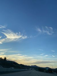 Road against sky during sunset