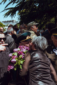 People in front of traditional building