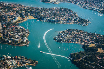 High angle view of city by sea