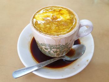 Close-up of cup of coffee on table