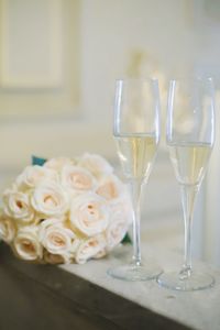 Close-up of white rose on table