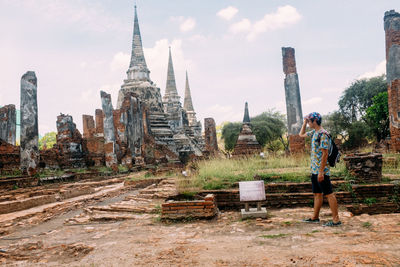 View of temple against building