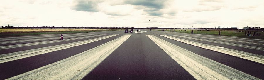 Road against cloudy sky