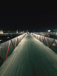 Empty footbridge at night