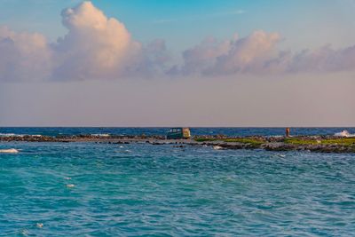 Scenic view of sea against sky during sunset