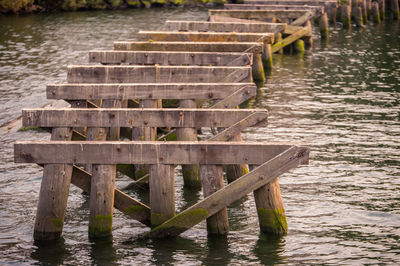 Damaged pier in lake