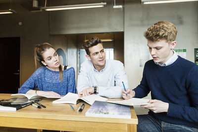 Friends studying in classroom