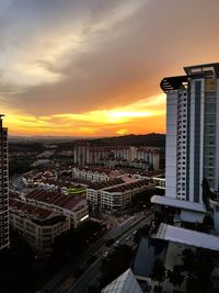 High angle view of cityscape against sky during sunset