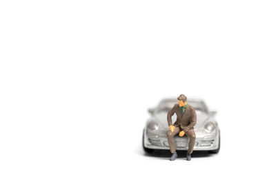 Man sitting in car