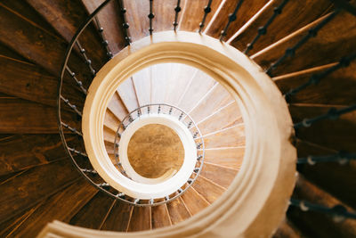 Directly below shot of spiral staircase in building