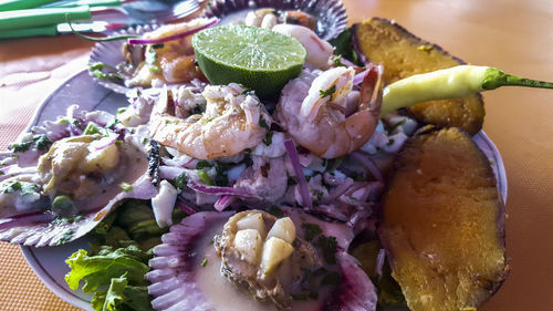 High angle view of sea food in plate on table