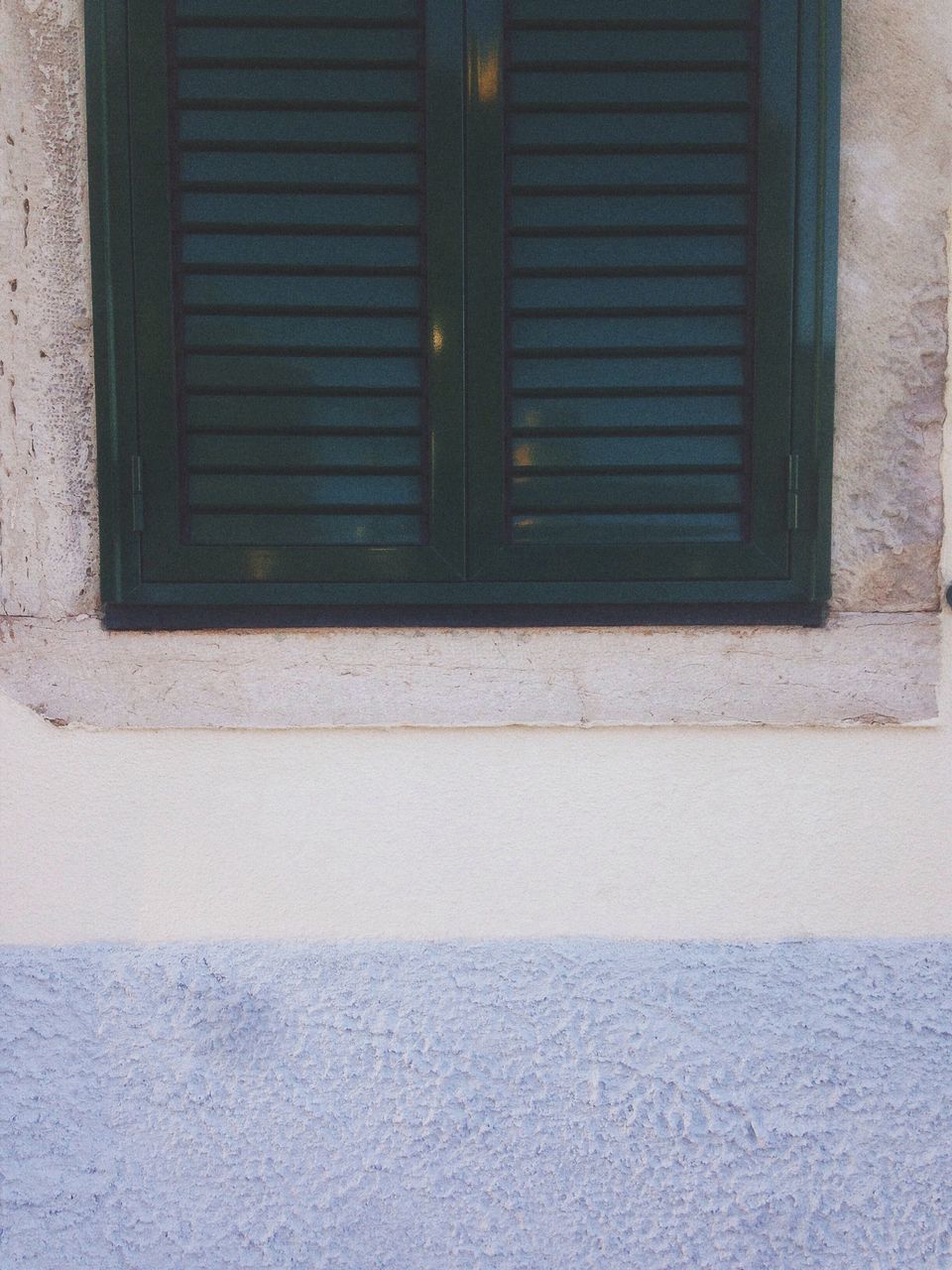 building exterior, architecture, built structure, window, closed, door, house, wall - building feature, building, wall, glass - material, day, brick wall, no people, outdoors, residential structure, city, residential building, street, shutter