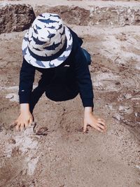 High angle view of man standing on beach