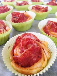 Close-up of salami roses on table