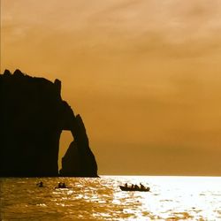 Scenic view of sea at sunset