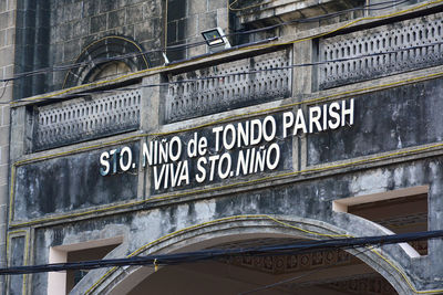 Low angle view of text on building