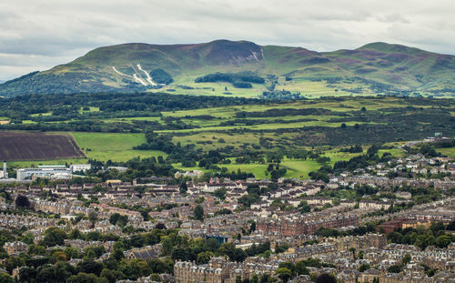 Aerial view of townscape against sky