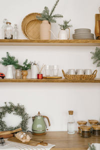 Winter kitchen with red and turquoise decorations, christmas kitchen utensils in the scandinavian 