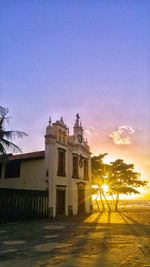 Building against sky during sunset