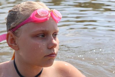 Close-up portrait of girl looking away