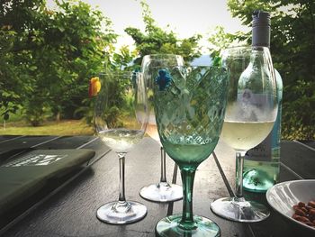 Close-up of wine bottles on table