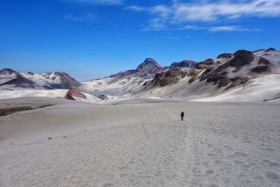 Scenic view of arid landscape against sky