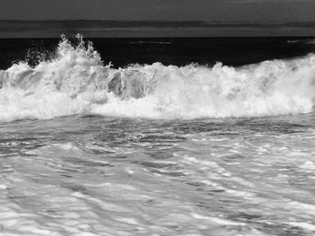 Waves splashing on rocks