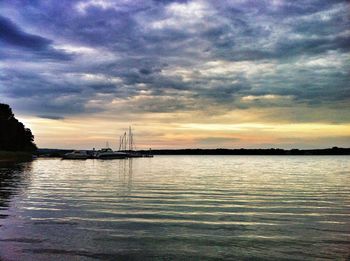 Scenic view of sea against cloudy sky