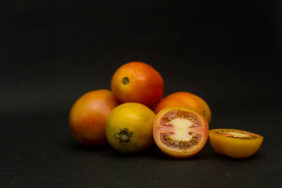 Close-up of orange fruits on table