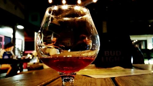 Close-up of wineglass on table in restaurant