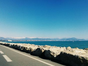 Scenic view of calm sea against clear sky