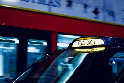 Close-up of taxi at night