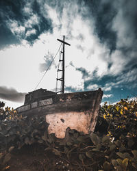 Abandoned boat against the sky
