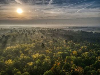 Scenic view of landscape against sky during sunset