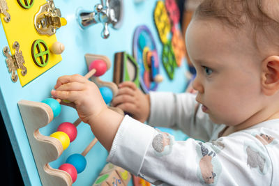 Close-up of boy looking at home