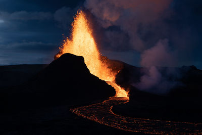 Beautiful volcano eruption and lava river