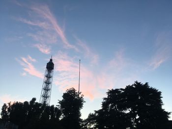 Low angle view of silhouette tower against sky during sunset