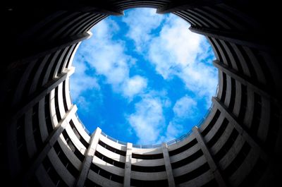 Low angle view of buildings against blue sky