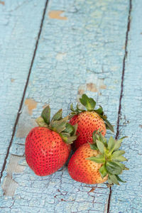 High angle view of strawberries on table