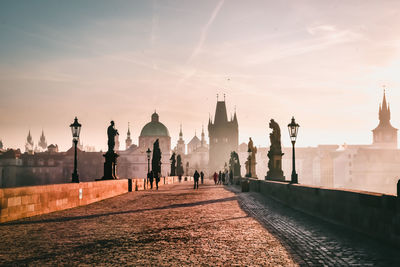 Panoramic view of buildings against sky at sunset