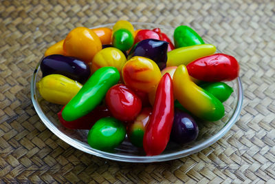 High angle view of multi colored candies on table