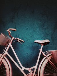 High angle view of abandoned bicycle against wall