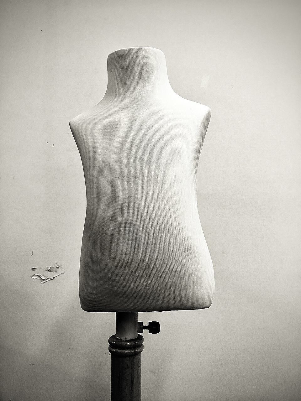 mannequin, human representation, representation, fashion, no people, art and craft, indoors, wall - building feature, still life, female likeness, day, craft, creativity, industry, lighting equipment, single object, close-up, studio shot, electric lamp, dressmaker's model