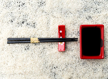 Directly above shot of telephone booth against white background