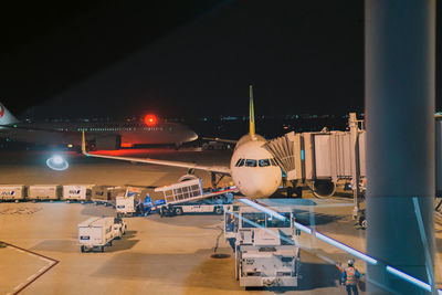 View of airplane at airport runway