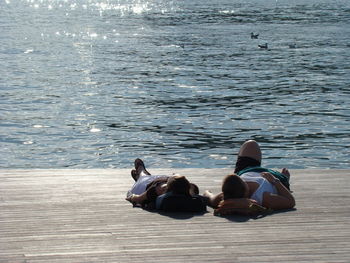 People relaxing in swimming pool